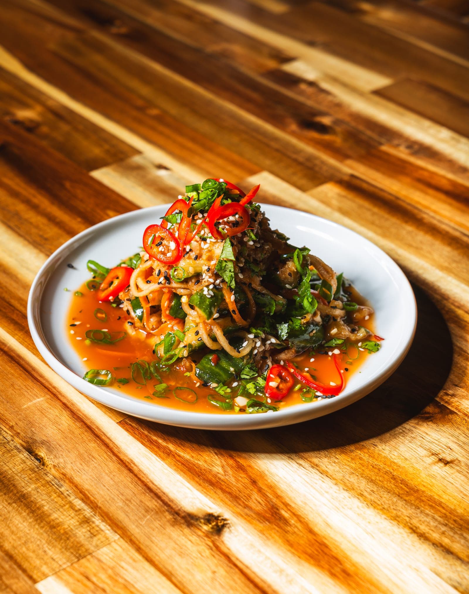 Noodles glossed in a fragrant chili sauce